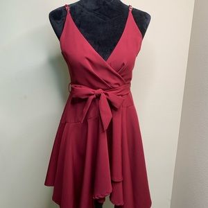 Burgundy v neck ruffled skirt bow tie dress.